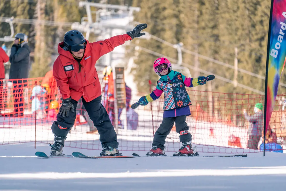 instructor helps rider with balance