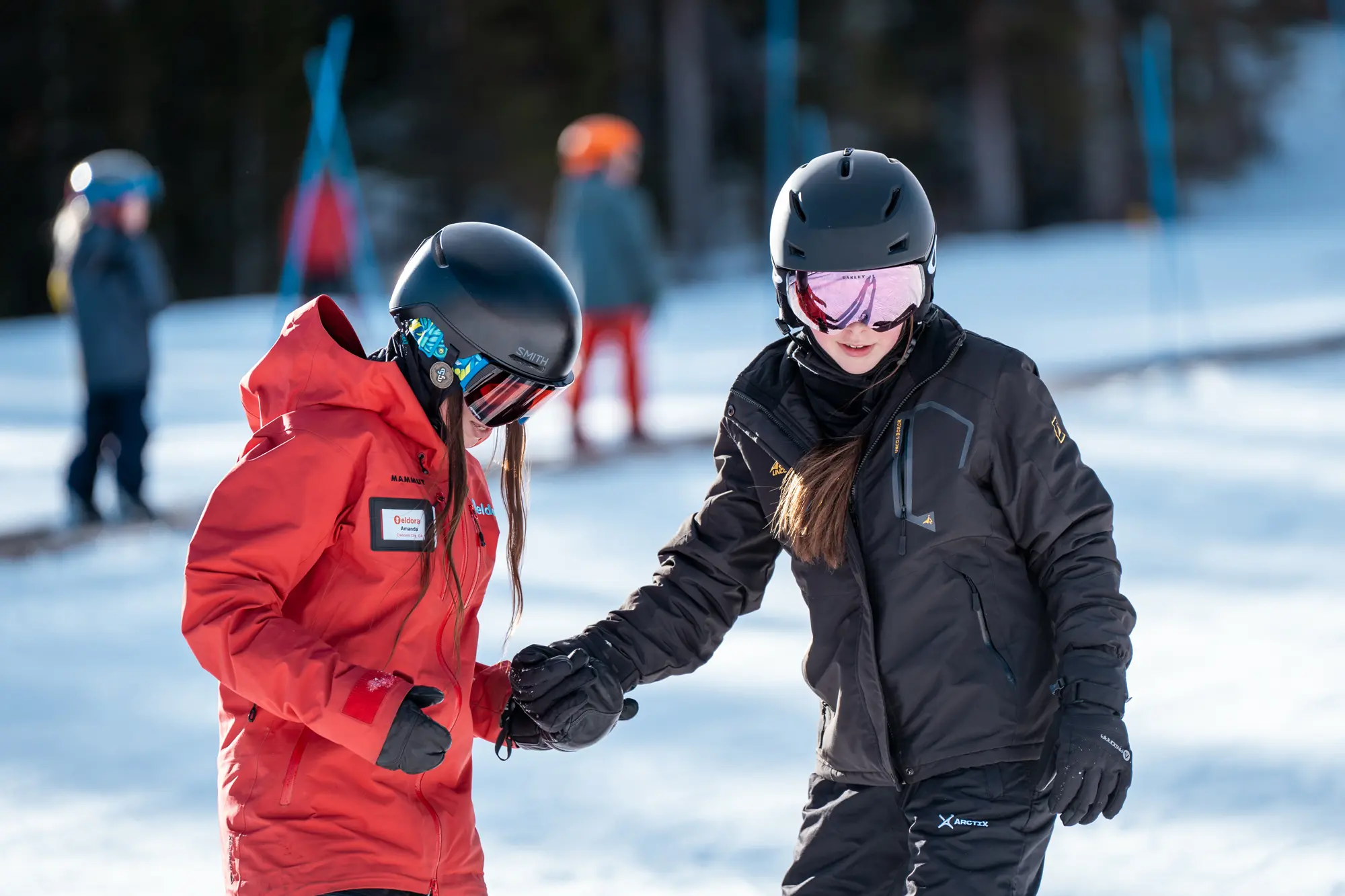 Women coaching someone just getting start